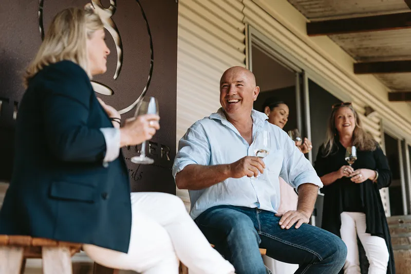 People enjoying wine at The Islander Estate Vineyards cellar door