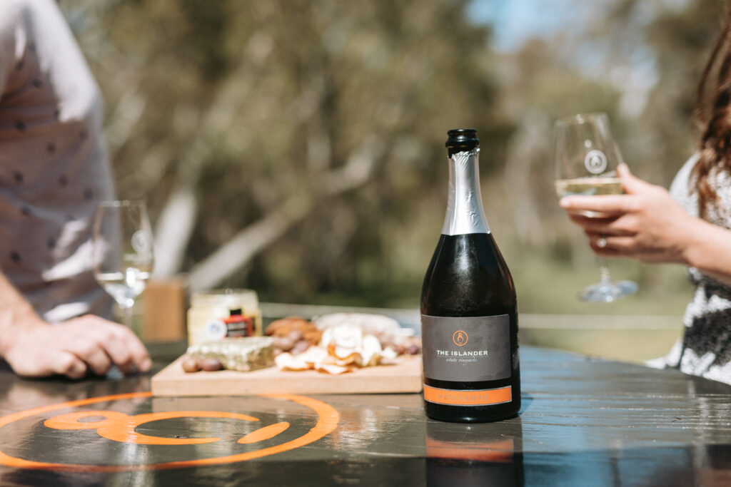 Summer dining on the deck at The Islander Estate Vineyards